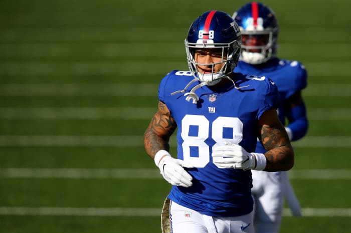 New York Giants tight end Evan Engram (88) takes the field before kickoff of an NFL Week 12 football game against the Cincinnati Bengals, Sunday, Nov. 29, 2020, at Paul Brown Stadium in Cincinnati.