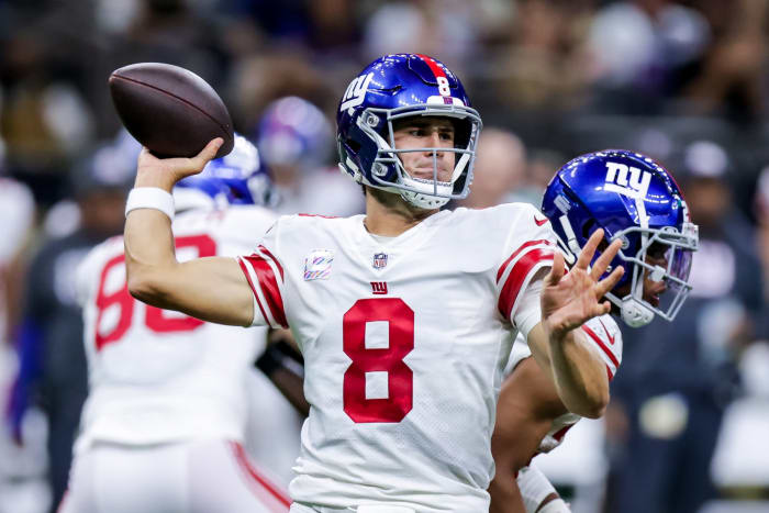 Oct 3, 2021; New Orleans, Louisiana, USA; New York Giants quarterback Daniel Jones (8) passes the ball against the New Orleans Saints during the second half at Caesars Superdome.