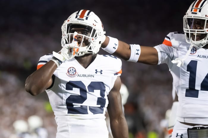 Auburn's Roger McCreary (23) motions to Penn State fans after making an interception late in the second quarter against Penn State at Beaver Stadium on Saturday, Sept. 18, 2021, in State College.