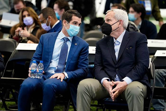 New York Giants General Manager Joe Schoen, left, and co-owner Steve Tisch talk before Schoen's introductory press conference at the Quest Diagnostics Training Center on Wednesday, Jan. 26, 2022.