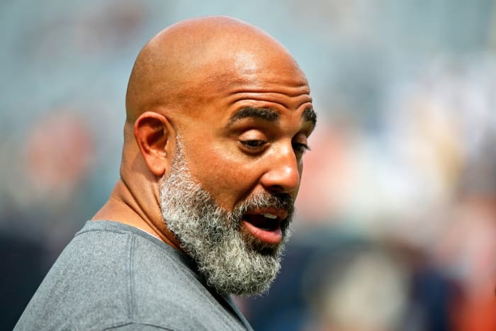 Aug 21, 2021; Chicago, Illinois, USA; Buffalo Bills offensive line coach Bobby Johnson talks on the sideline during the first half against the Chicago Bears at Soldier Field. The Buffalo Bills won 41-15.