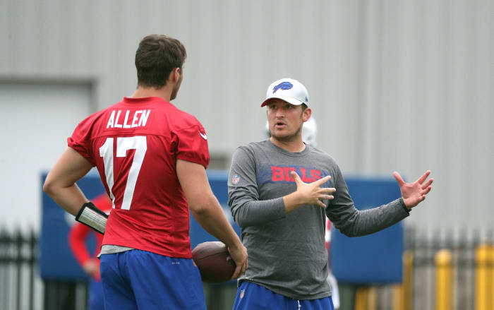 Bills rookie quarterback Josh Allen before practice with offensive assistant Shea Tierney.
