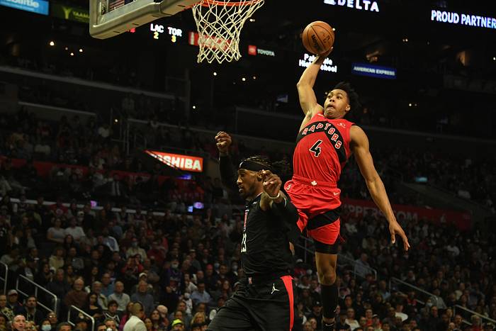 Toronto Raptors forward Scottie Barnes (4) dunks against Los Angeles Clippers forward Robert Covington (23) during the second half at Crypto.com Arena