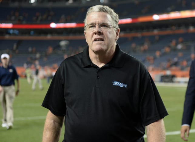 Sep 5, 2013; Denver, CO, USA; American sportswriter Peter King walks off the field following the game between the Baltimore Ravens against the Denver Broncos at Sports Authority Field at Mile High. The Broncos defeated the Ravens 49-27.