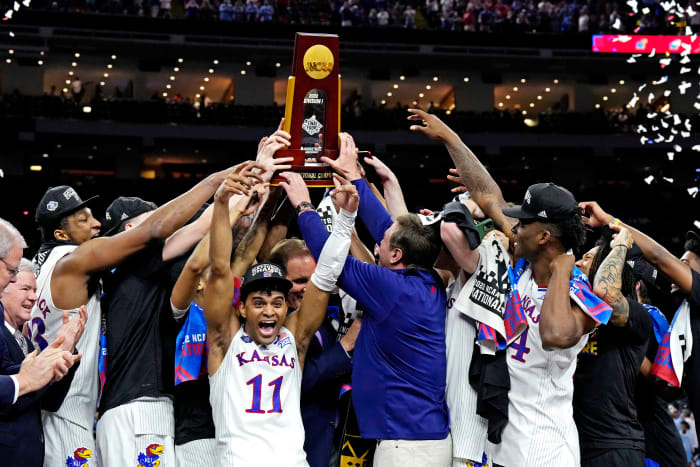 Apr 4, 2022; New Orleans, LA, USA; The Kansas Jayhawks celebrate after defeating the North Carolina Tar Heels during the 2022 NCAA men's basketball tournament Final Four championship game at Caesars Superdome. Stephen Lew-USA TODAY Sports