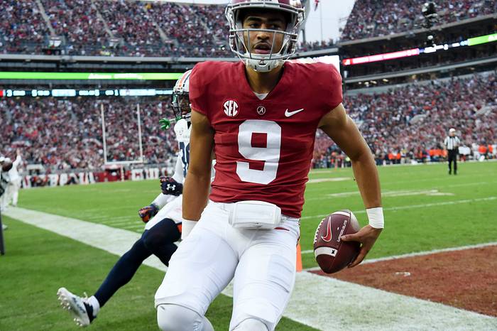 Alabama quarterback Bryce Young (9) beats Auburn cornerback Jaylin Simpson (36) to the end zone for a touchdown at Bryant-Denny Stadium.