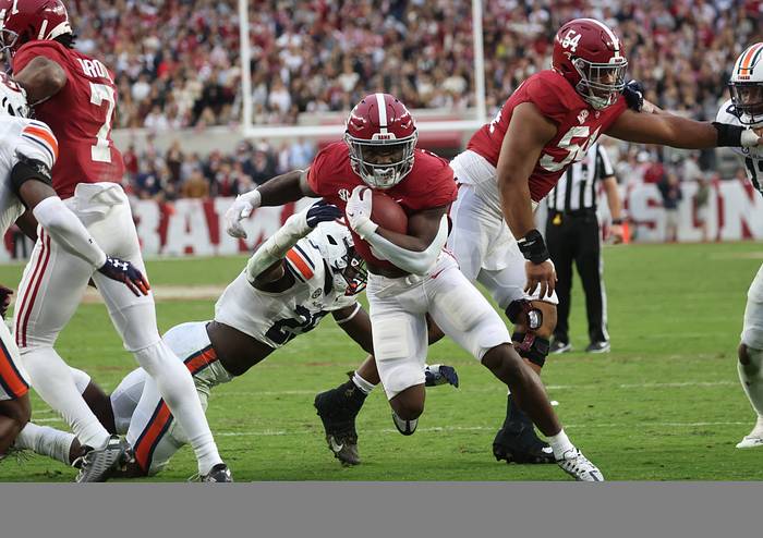 Alabama running back Roydell Williams runs for the end zone in the Iron Bowl