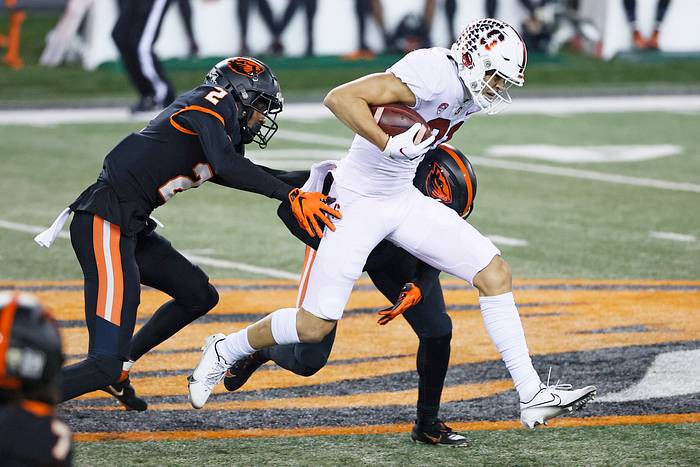 Stanford Cardinal wide receiver Brycen Tremayne (81) catches a pass while being defended by Oregon State Beavers defensive back Rejzohn Wright (1) during the second half at Reser Stadium.