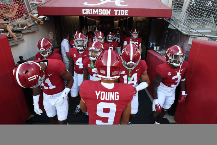 Bryce Young leads the players out of the tunnel