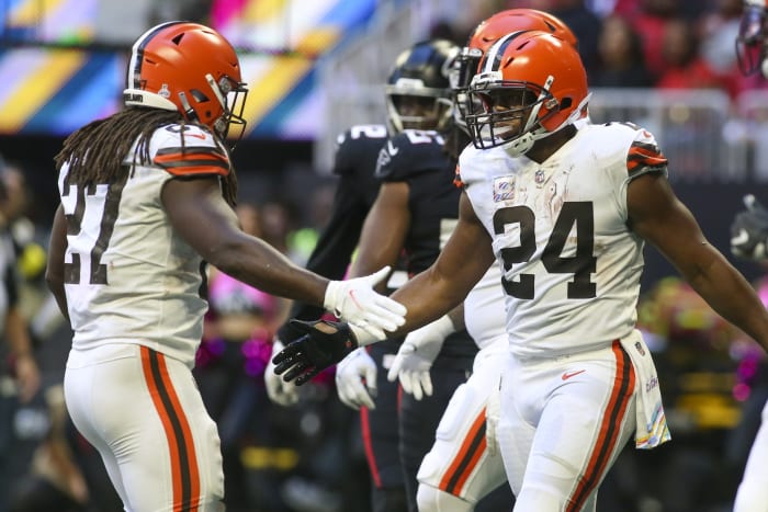 Oct 2, 2022; Atlanta, Georgia, USA; Cleveland Browns running back Nick Chubb (24) celebrates after a touchdown with running back Kareem Hunt (27) against the Atlanta Falcons in the second half at Mercedes-Benz Stadium. Mandatory Credit: Brett Davis-USA TODAY Sports