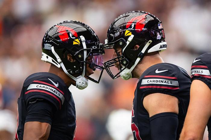 Arizona Cardinals tight end Zach Ertz (right) celebrates a touchdown with quarterback Joshua Dobbs against the Cincinnati Bengals in the first half at State Farm Stadium.