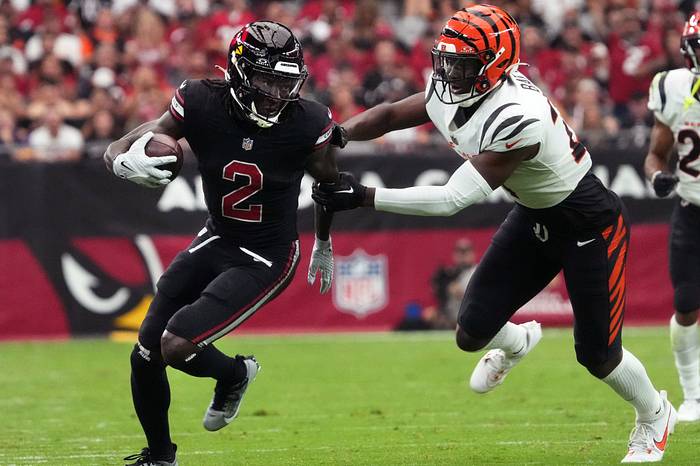 Arizona Cardinals receiver Marquise Brown (2) runs against Cincinnati Bengals safety Jordan Battle (27) at State Farm Stadium.