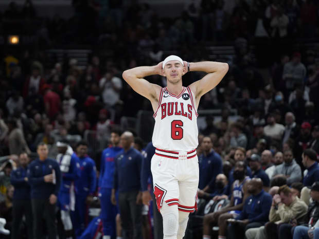 Chicago Bulls guard Alex Caruso (6) reacts after missing a three point basket