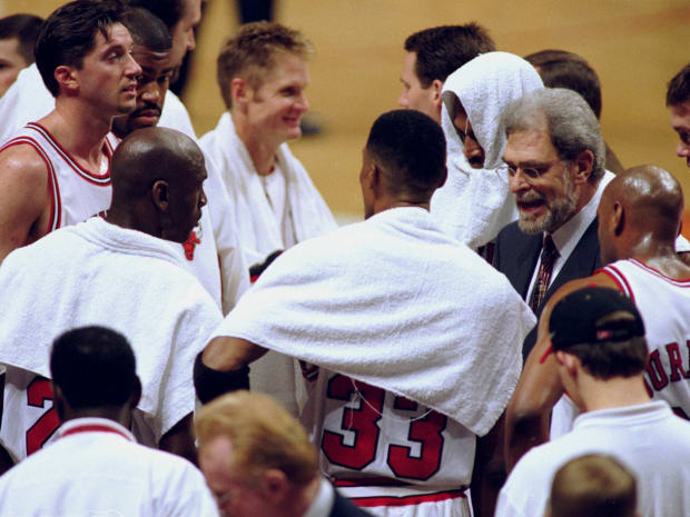 April 8, 1998; Chicago Bulls coach Phil Jackson with Scott Burrell Scottie Pippen, Michael Jordan, Toni Kukoc, Dickey Simpkins, Steve Kerr and Dennis Rodman