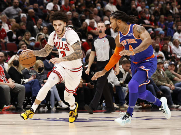 October 28, 2021; Chicago Bulls guard Lonzo Ball drives to the basket against New York Knicks guard Derrick Rose