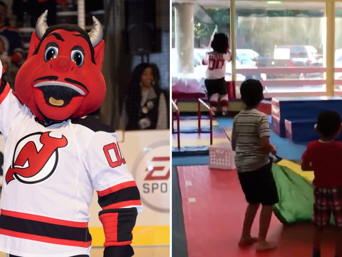 new jersey devils mascot breaks glass