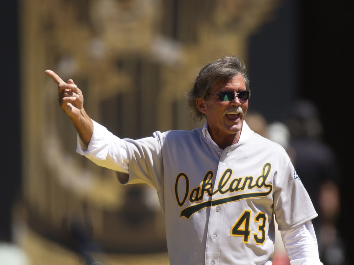 Dennis Eckersley holds up his Hall of Fame Plaque moments before