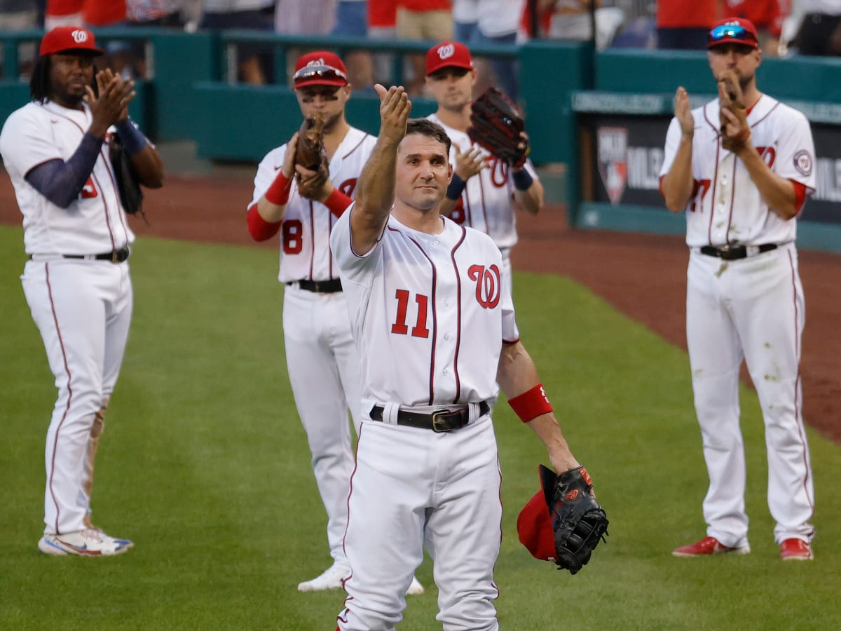 Keith Zimmerman, father of former Washington Nationals baseball player Ryan  Zimmerman, holds up Ryan's jersey at a jersey retirement ceremony before a  baseball game between the Nationals and the Philadelphia Phillies, Saturday