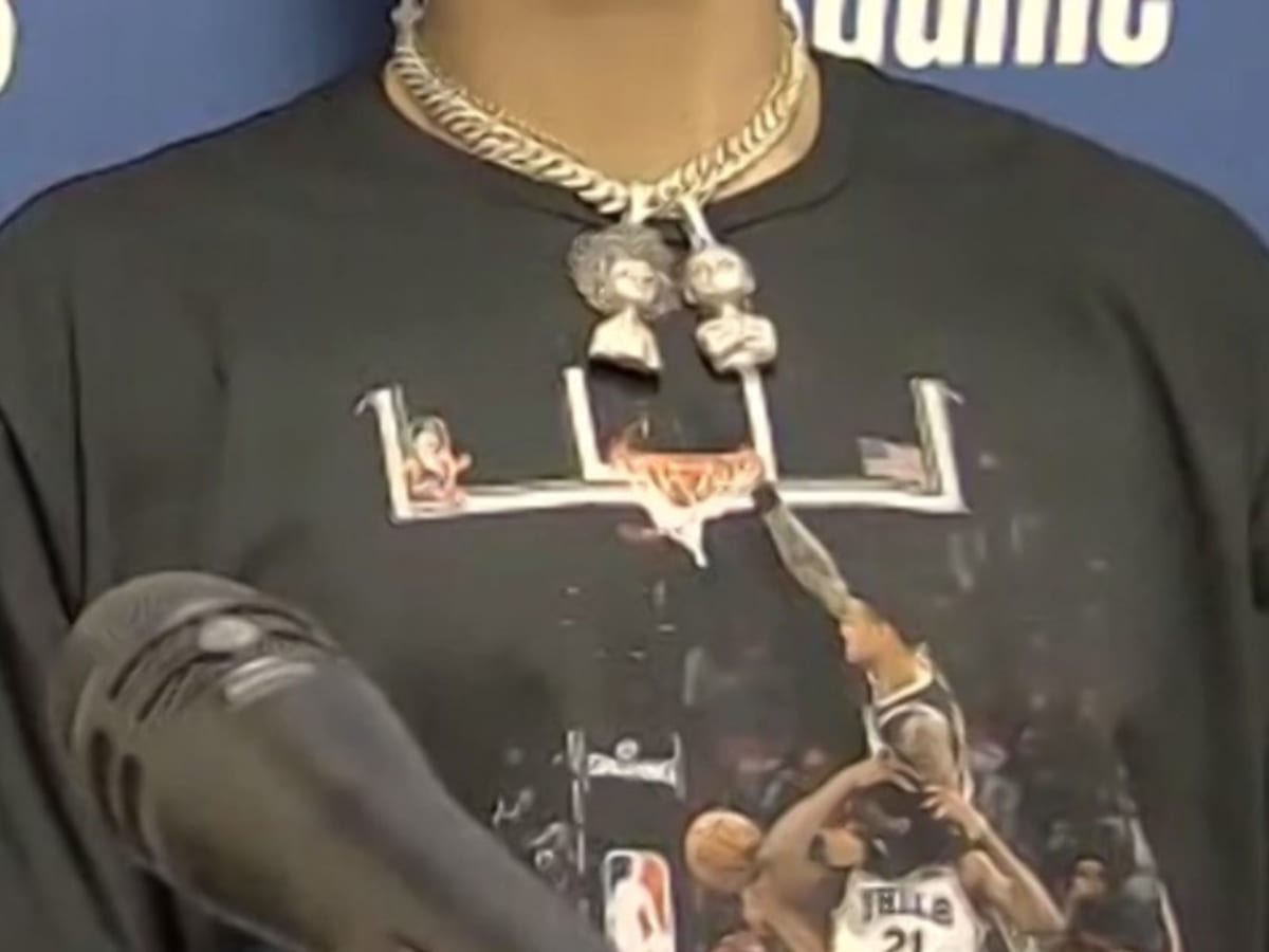 John Collins Pulled Up to His Interview Wearing a Shirt of Him Dunking on  Joel Embiid : r/nba