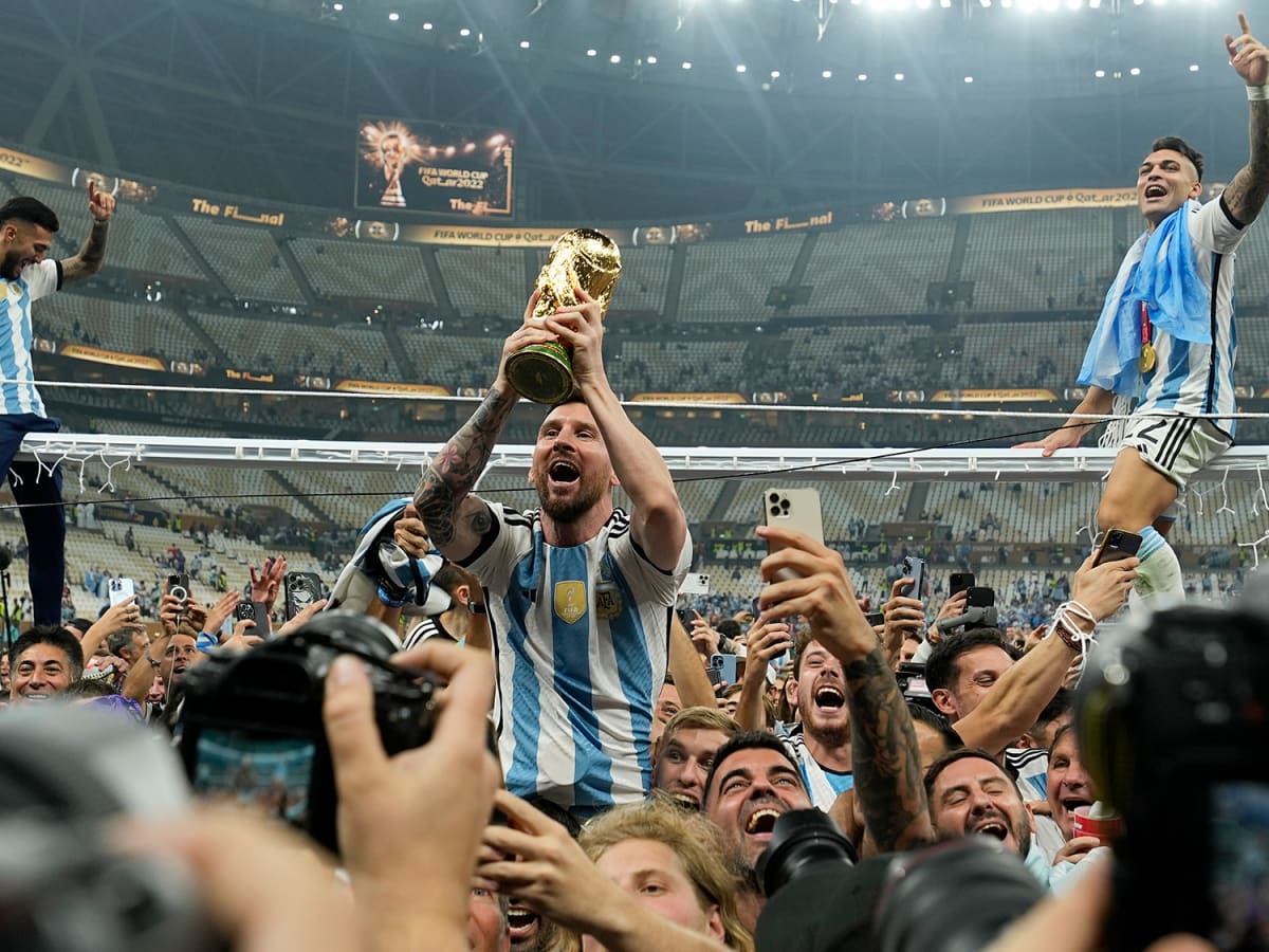 Messi kissing the World Cup Trophy Argentina World Cup Champions