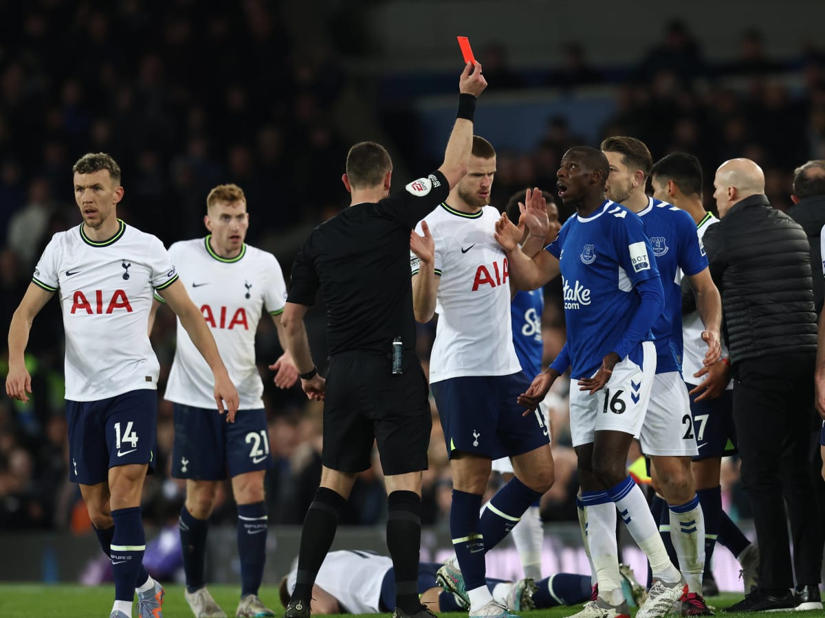 Abdoulaye Doucoure sent off for hitting Harry Kane in his face