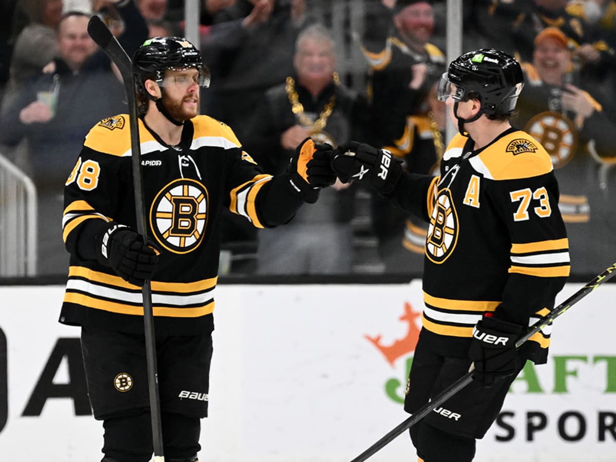 Bruins beat Devils 2-1, match NHL record with 62nd win - The San