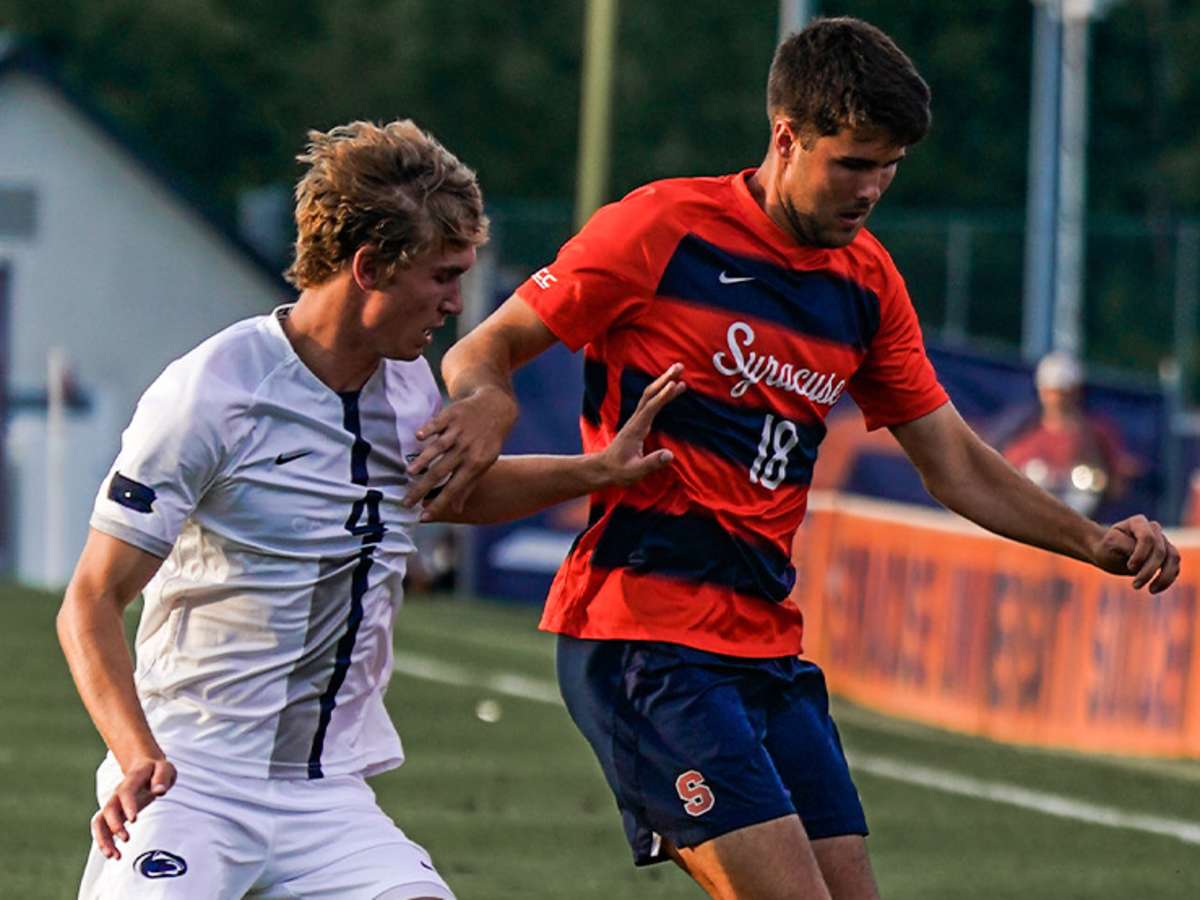 November 27, 2022: Cornell Big Red defender Andrew Johnson (29) heads the  ball against the Syracuse Orange during a third round match of the 2022  NCAA Men's Division I Soccer Championship on