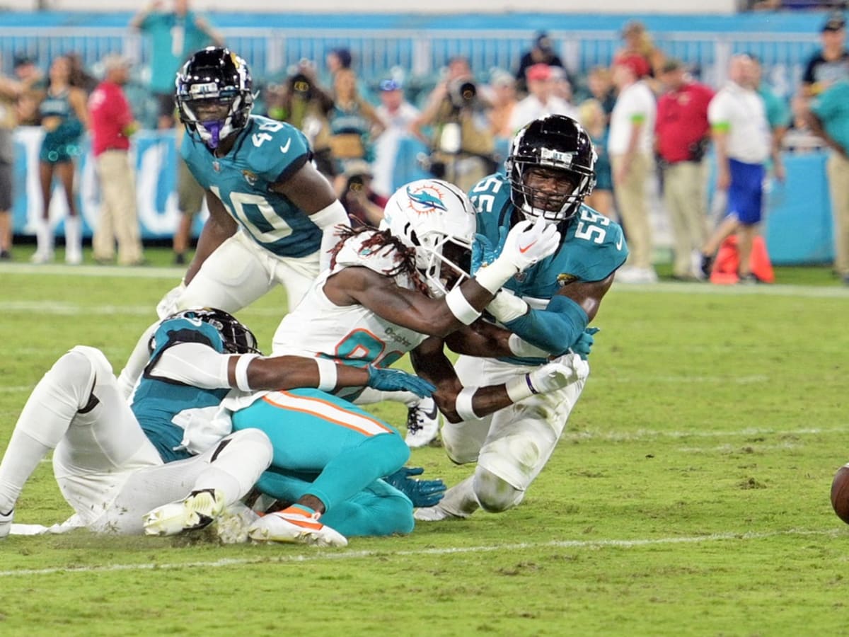 Dolphins WR Daewood Davis carted off with injury; Miami-Jacksonville game  ends early