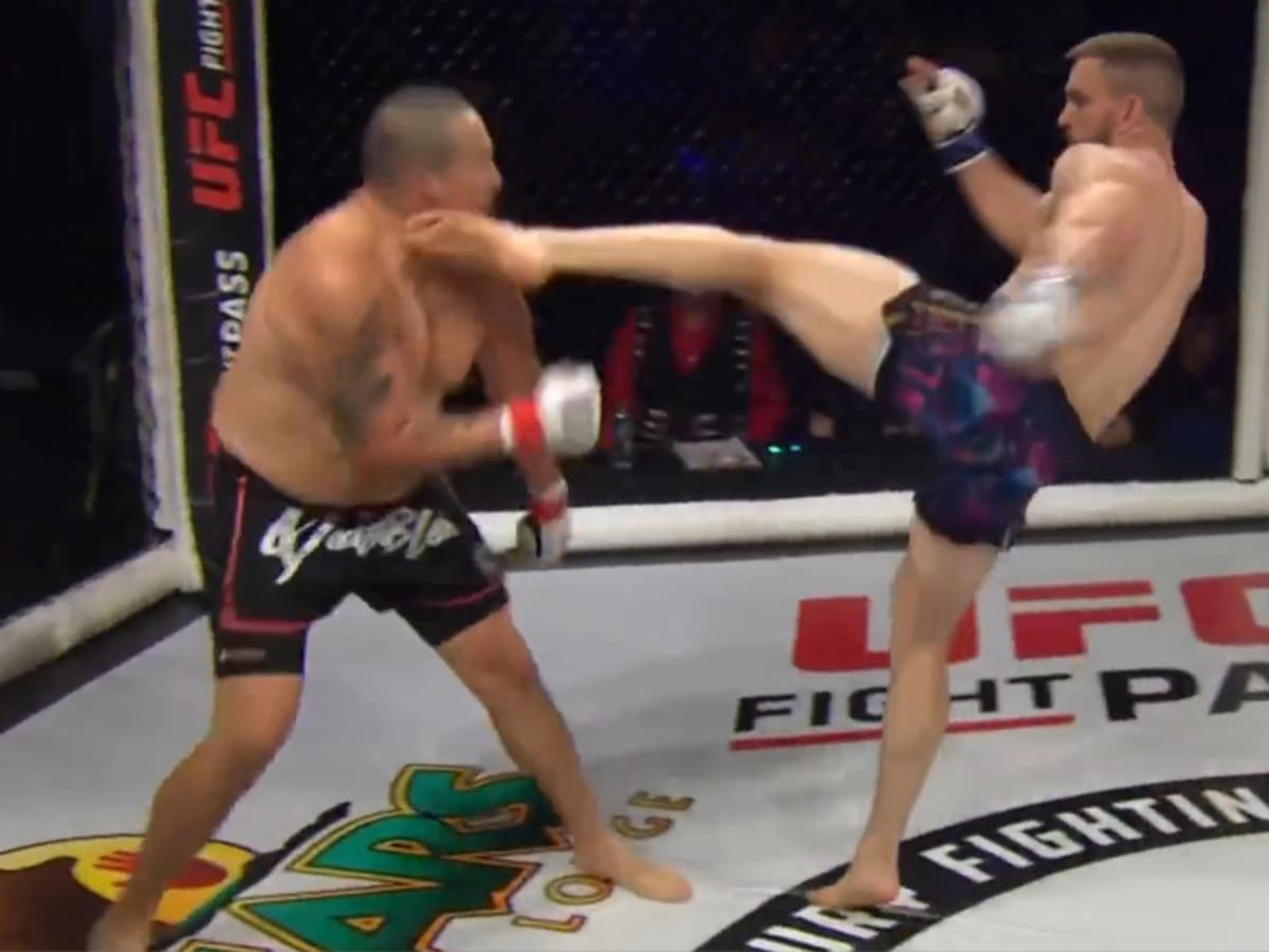 VIDEO MMA Fighter Knocked Stiff and Bounces Off Cage After Crazy Head Kick KO