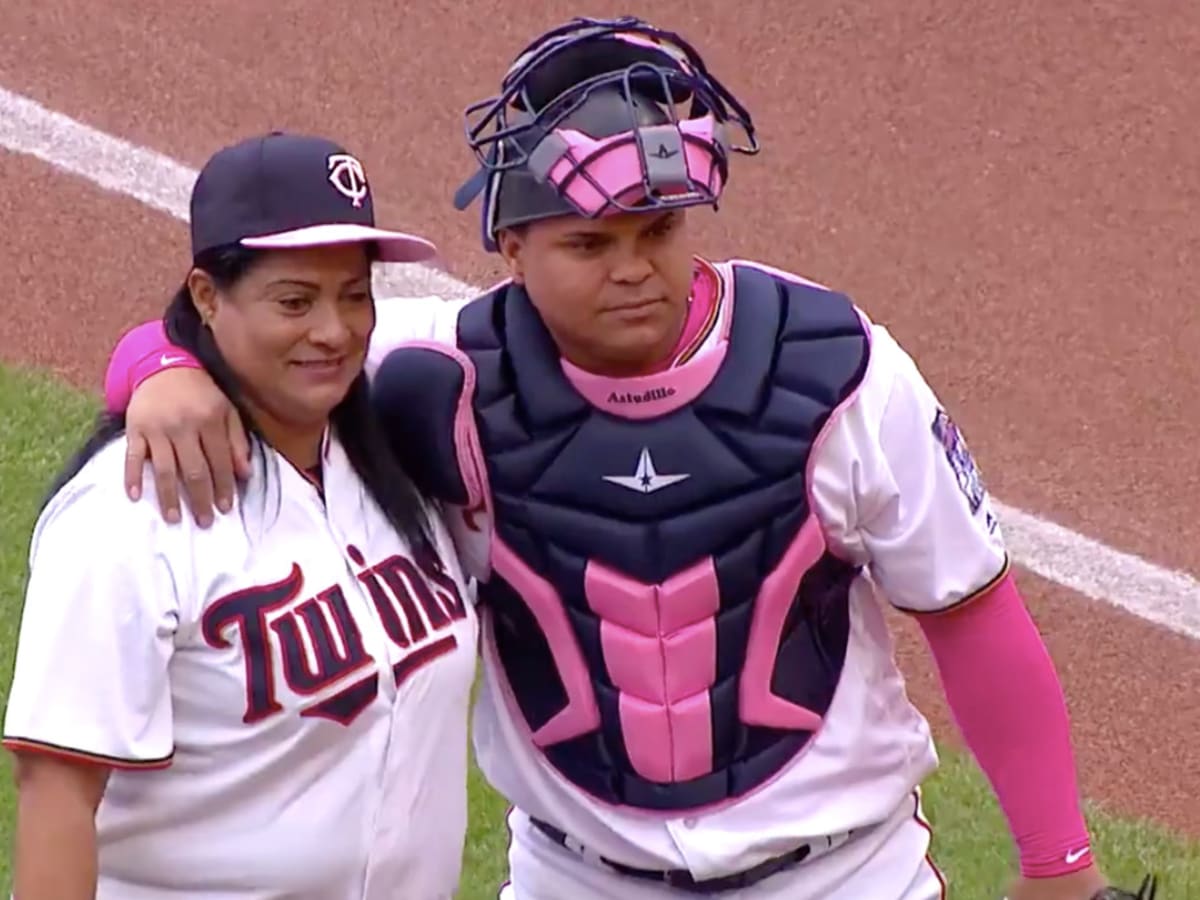 Watch: Willians Astudillo's mom throws a perfect strike to her son