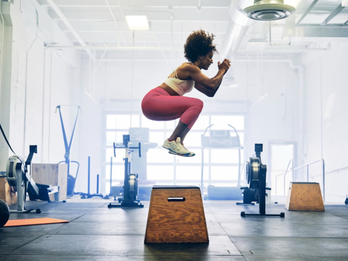 Premium Photo  Fitness jump and portrait of strong woman in