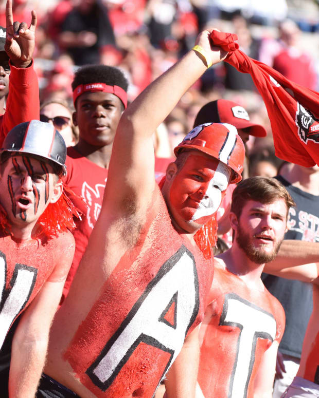 Wolfpack fans cheer during the first half against the Florida State Seminoles at Carter-Finley Stadium. (Rob Kinnan-USA TODAY Sports)
