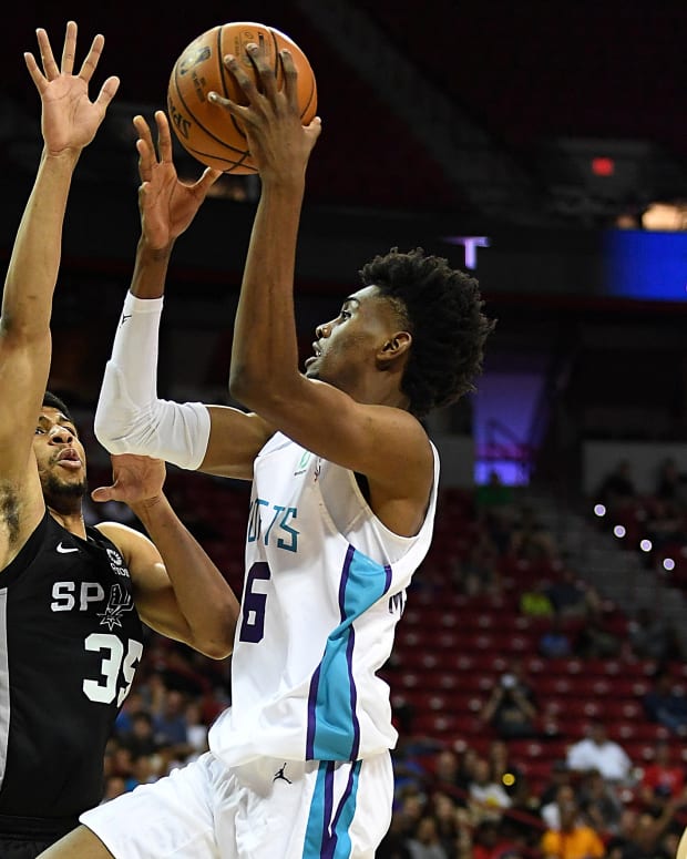 Charlotte Hornets forward Jalen McDaniels (6) shoots against San Antonio Spurs forward Jordan Barnett (35) during the second half of an NBA Summer League game at Thomas & Mack Center. (Stephen R. Sylvanie-USA TODAY Sports)