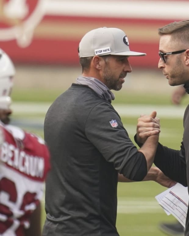 San Francisco 49ers head coach Kyle Shanahan (left) shakes hands with Arizona Cardinals head coach Kliff Kingsbury (right) after the game at Levi's Stadium.