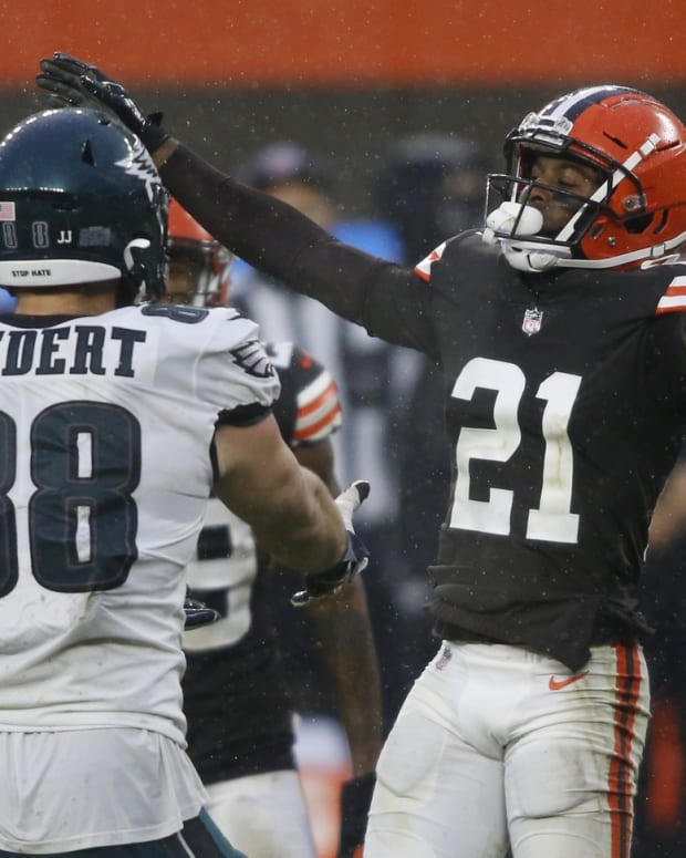 Nov 22, 2020; Cleveland, Ohio, USA; Cleveland Browns cornerback Denzel Ward (21) reacts after a pass play to Philadelphia Eagles tight end Dallas Goedert (88) during the second half at FirstEnergy Stadium. Mandatory Credit: Scott Galvin-USA TODAY Sports