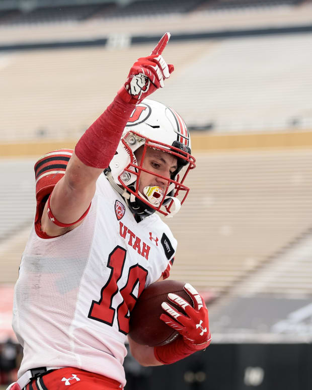 Dec 12, 2020; Boulder, Colorado, USA; Utah Utes wide receiver Britain Covey (18) celebrates after scoring a touchdown against the Colorado Buffaloes in the third quarter at Folsom Field.