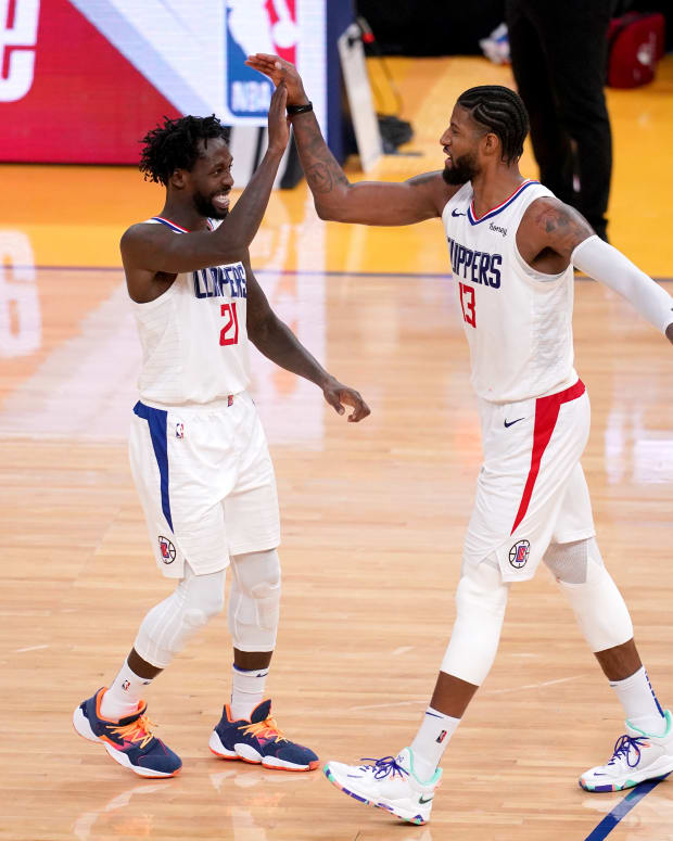 Jan 6, 2021; San Francisco, California, USA; Los Angeles Clippers guard Patrick Beverley (21) and forward Paul George (13) react after the Golden State Warriors were called for a foul in the fourth quarter at the Chase Center. Mandatory Credit: Cary Edmondson-USA TODAY Sports