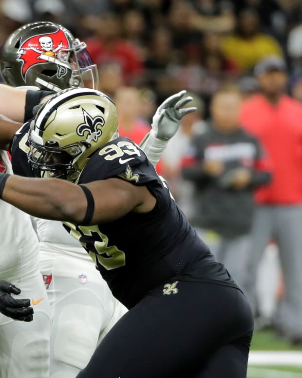 Oct 6, 2019; New Orleans, LA, USA; New Orleans Saints defensive tackle David Onyemata (93) rushes against Tampa Bay Buccaneers offensive guard Alex Cappa (65) during the first quarter at the Mercedes-Benz Superdome. Mandatory Credit: