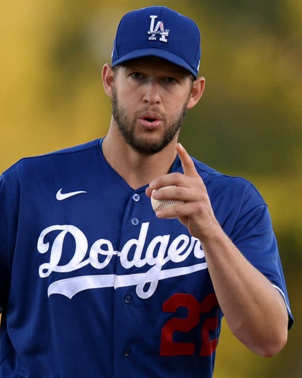 Mar 4, 2020; Phoenix, Arizona, USA; Los Angeles Dodgers starting pitcher Clayton Kershaw (22) reacts during the first inning of a spring training game against the San Francisco Giants at Camelback Ranch. Mandatory Credit: Joe Camporeale-USA TODAY Sports