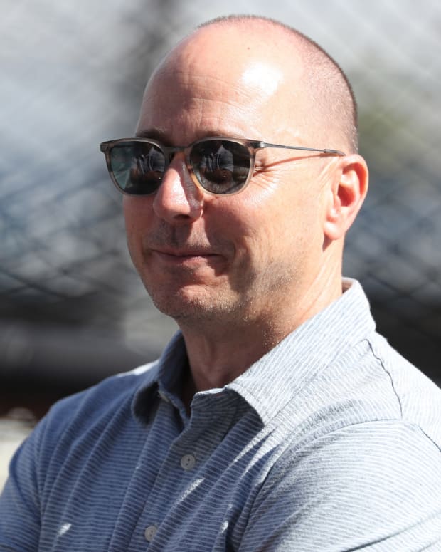 Brian Cashman at Yankees batting practice