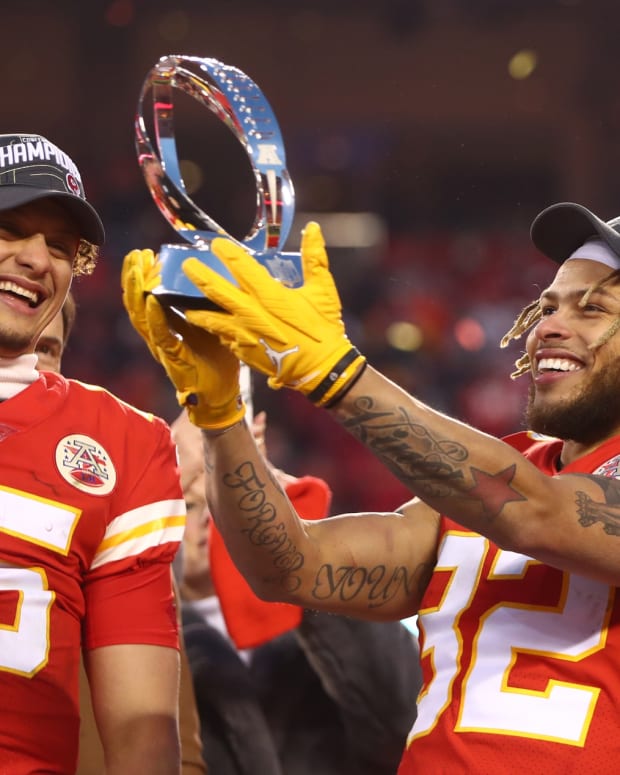 Jan 19, 2020; Kansas City, Missouri, USA; Kansas City Chiefs safety Tyrann Mathieu (32) celebrates with the Lamar Hunt Trophy after defeating the Tennessee Titans in the AFC Championship Game at Arrowhead Stadium. Mandatory Credit: Mark J. Rebilas-USA TODAY Sports