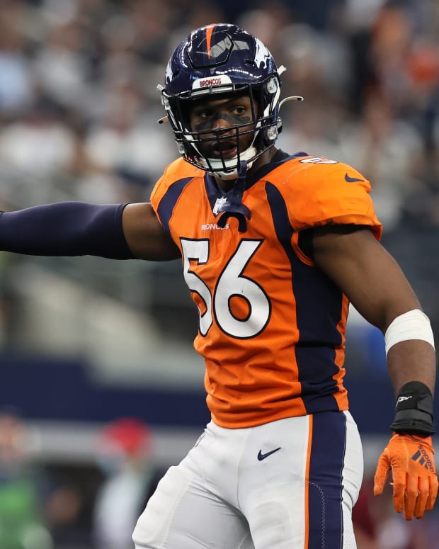 Denver Broncos linebacker Baron Browning (56) reacts after forcing a three and out in the third quarter against the Dallas Cowboys at AT&T Stadium.