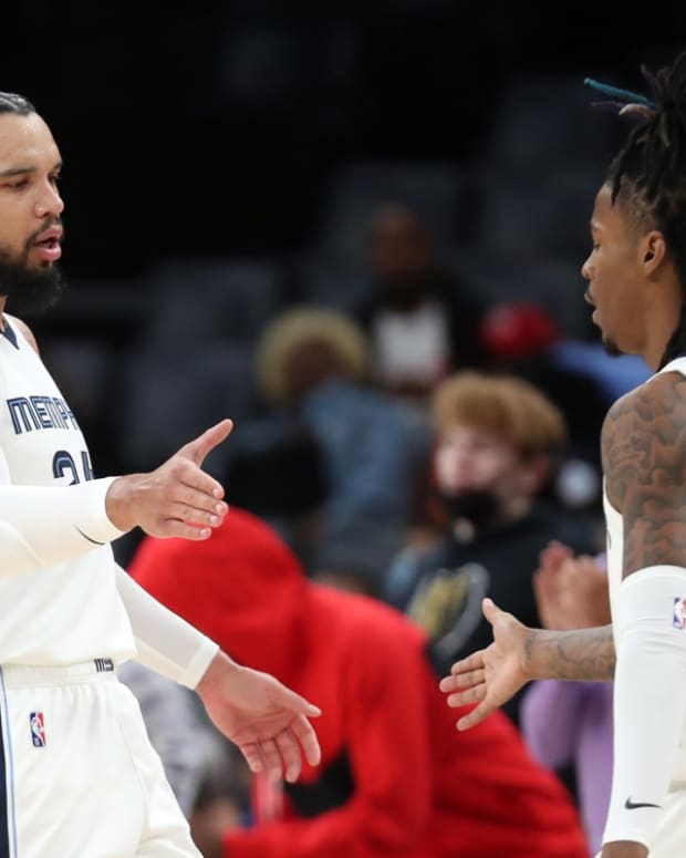 Nov 10, 2021; Memphis, Tennessee, USA; Memphis Grizzles guard Dillon Brooks (left) and Memphis Grizzles guard Ja Morant (right) high five after a basket during the first half at FedExForum. Mandatory Credit: Petre Thomas-USA TODAY Sports