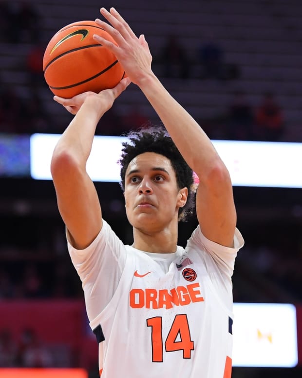 Nov 30, 2021; Syracuse, New York, USA; Syracuse Orange center Jesse Edwards (14) shoots a free throw against the Indiana Hoosiers during the second half at the Carrier Dome. Mandatory Credit: Rich Barnes-USA TODAY Sports