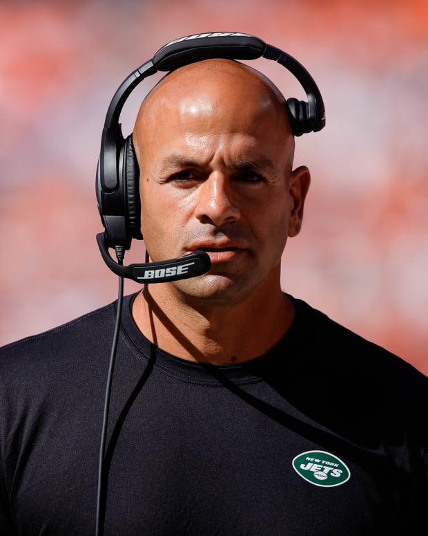 Jets head coach Robert Saleh wears headset