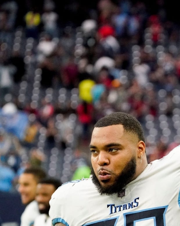 Tennessee Titans defensive tackle Jeffery Simmons (98) celebrates their win over the Texans at NRG Stadium Sunday, Jan. 9, 2022 in Houston, Texas.