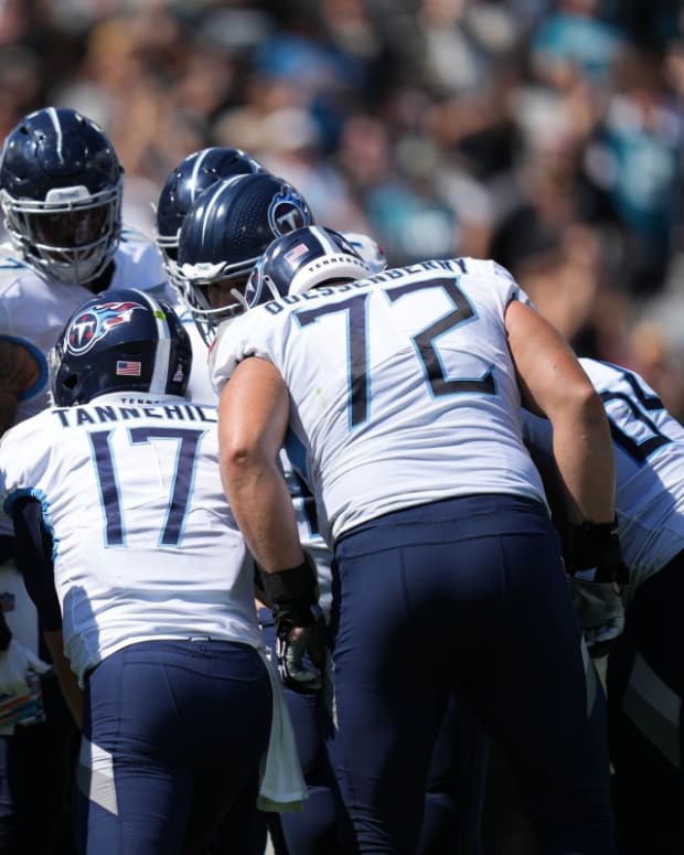 Tennessee Titans quarterback Ryan Tannehill (17) huddles with his offense during the first half against the Jacksonville Jaguars at TIAA Bank Field.