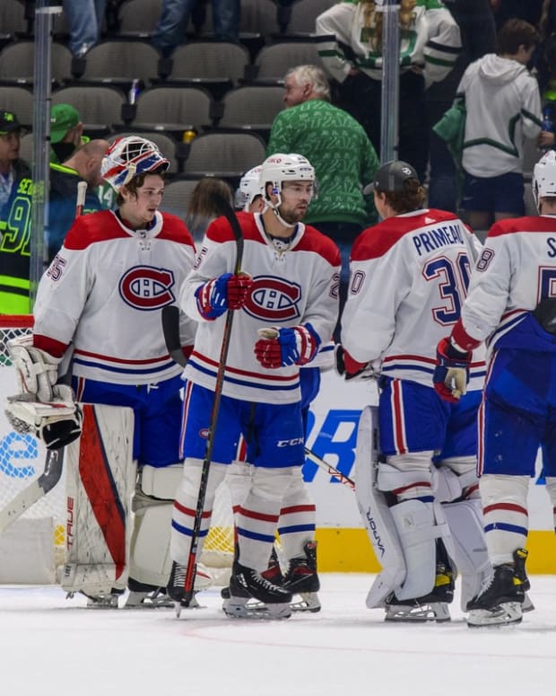 Jan 18, 2022; Dallas, Texas, USA; Montreal Canadiens goaltender Sam Montembeault (35) and his teammates celebrate the win over the Dallas Stars at the American Airlines Center. Mandatory Credit: Jerome Miron-USA TODAY Sports