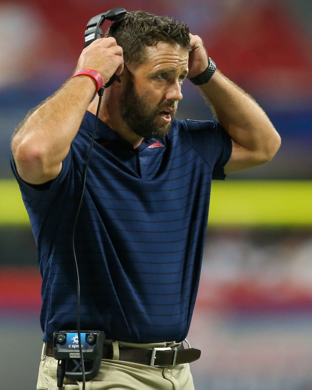 Mississippi Rebels special teams coordinator Coleman Hutzler on the sideline against the Louisville Cardinals in the second half at Mercedes-Benz Stadium.