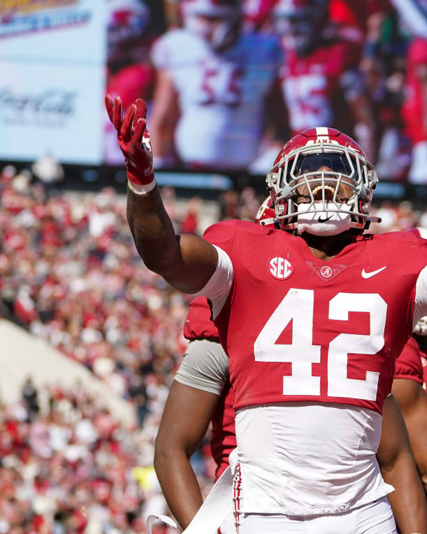 Alabama Crimson Tide linebacker Jaylen Moody (42) reacts after returning a blocked punt by the New Mexico State Aggies at Bryant-Denny Stadium.